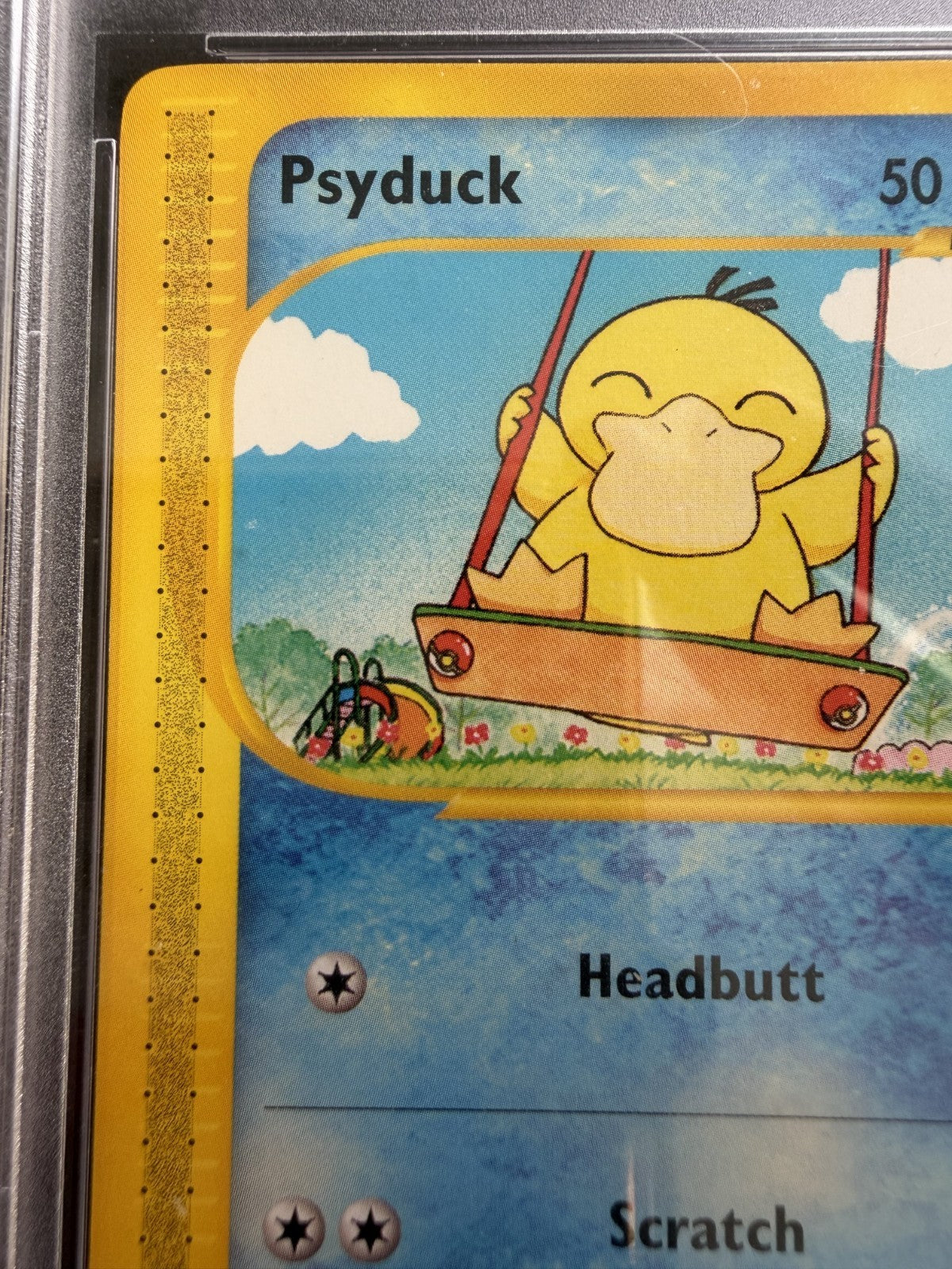 Psyduck 104/147 Aquapolis Common Pokemon Card 2002 - (Pop 141) - PSA 8