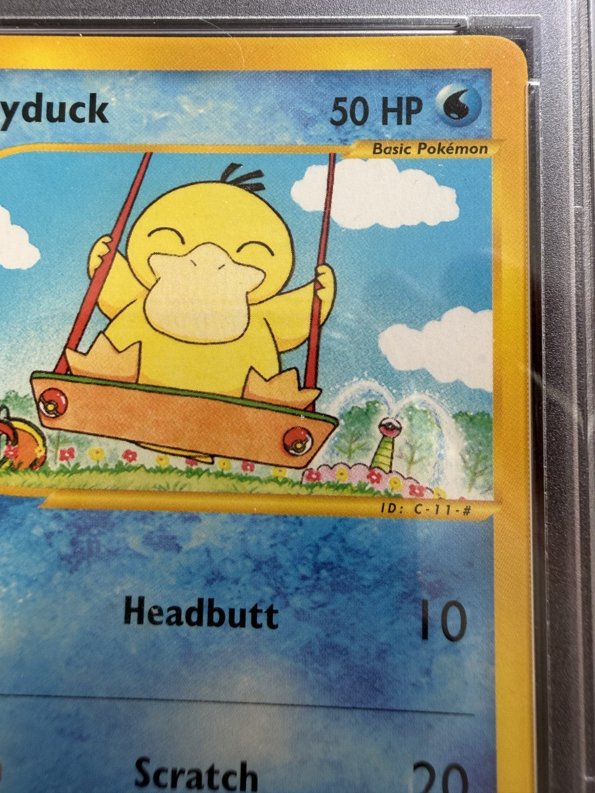 Psyduck 104/147 Aquapolis Common Pokemon Card 2002 - (Pop 141) - PSA 8